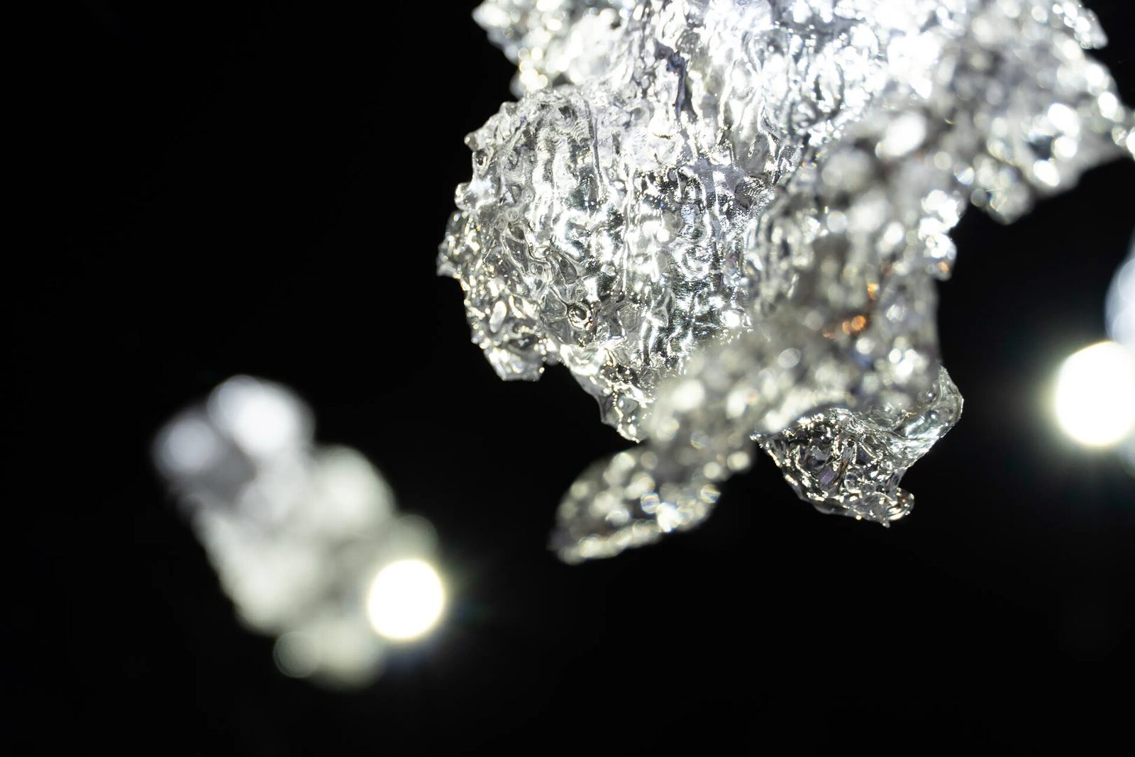 Translucent 3D-printed form made from Shenzhen material and sound data, close-up.